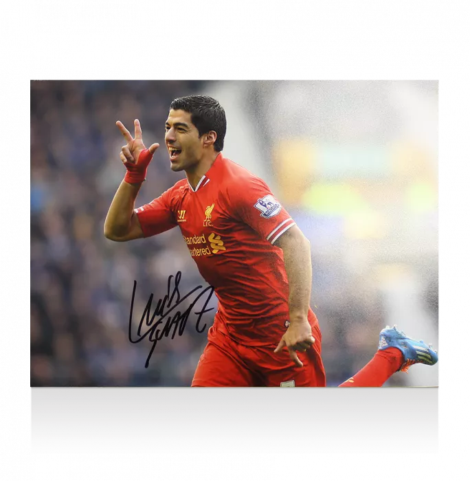 Luis Suarez Signed Liverpool Photo: Trademark Celebration