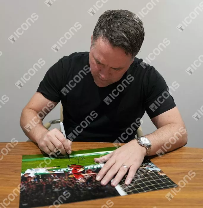 Michael Owen Signed Liverpool FC Photo In Black Wooden Frame: Scoring Against Manchester United