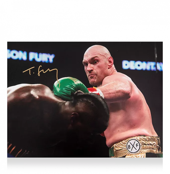 Tyson Fury Signed Boxing Photo: Punching Deontay Wilder