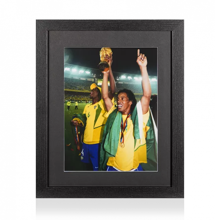 UNSIGNED Ronaldinho Photo In Black Wooden Frame: Brazil 2002 World Cup Aloft